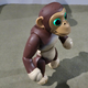 Illustration for article titled The Zoomer Robot Chimp Stands and Balances on Two Feet Better Than a Toddler Can